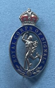 Royal Signals. A small silver and enamelled brooch / badge